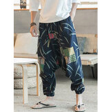 Pantalones holgados de yoga estilo harén con estampado floral étnico para hombres